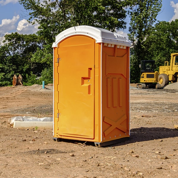 how often are the portable restrooms cleaned and serviced during a rental period in Harvey